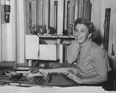 Helen Raitt typing the log in the laboratory on board the R/V Spencer F. Baird during the Capricorn Expedition