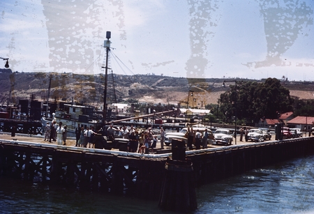 Dill #14 [People waving farewell to R/V HORIZON departing Naval Electronic Laboratory dock, San Diego]