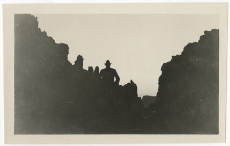 Silhouette of man in canyon, Arizona