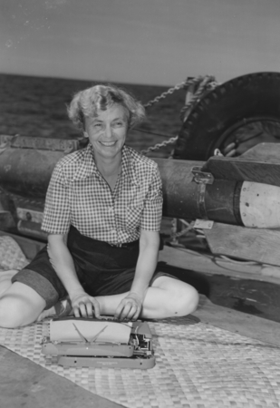 Helen Raitt types on the deck of R/V Spencer F. Baird