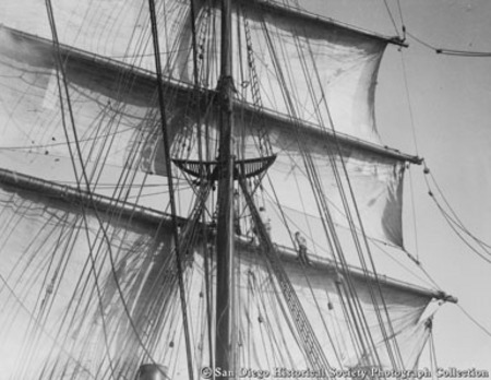 Crew on main mast rigging of Pacific Queen