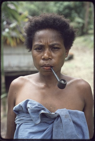 Kairiru: woman smoking a pipe