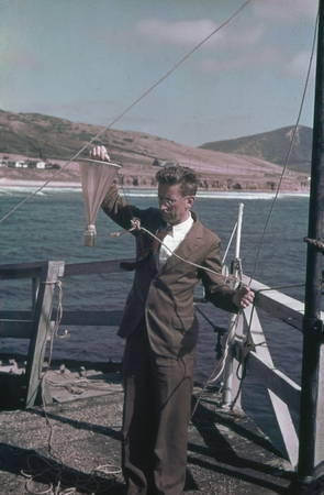 Marston Cleaves Sargent (1906-1986)with plankton net on Scripps Institution of Oceanography pier, 1938