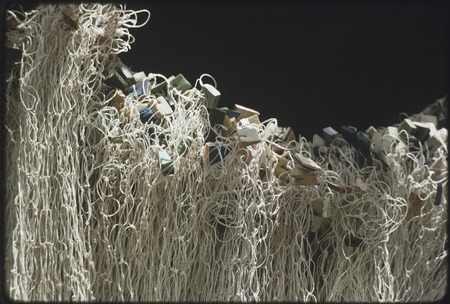 Fishing net with floats made of small pieces of rubber debris