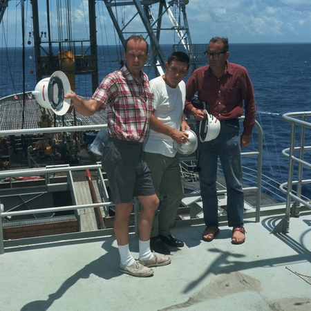 The &quot;Big Three Confer&quot; aboard the research ship D/V Glomar Challenger. (Left to right); Melvin N.A. Peterson professor of ...