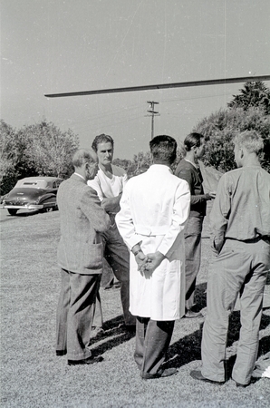 Talking during film production of the &quot;Cruise of the Zaca&quot; at Scripps Institution of Oceanography, (left to right) Scripps...