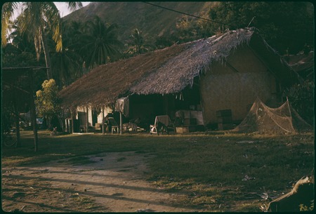 House with fishnet drying outside, Papetoai, Moorea