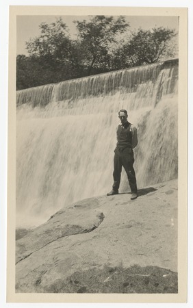 Man posing near spillway at Boulder Creek diverting dam