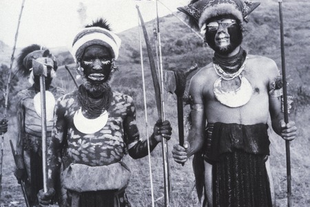 The anthropologist, John Leroy and another man, dressed for a ceremony