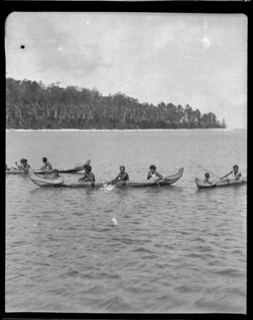 Several people on canoes