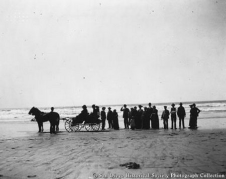 People with horse and carriage on Encinitas beach