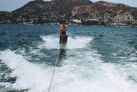 [Man water skiing in harbor, Mexico]