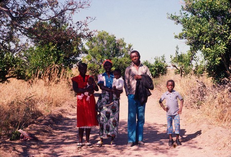 Family on road near village of Nsama