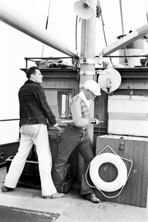Roger Revelle (left) and Richard Howell Fleming during coring operations aboard R/V Scripps