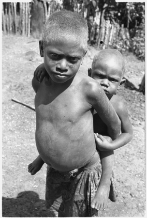 Children in clearing at Gwagwani&#39;ulou hamlet.