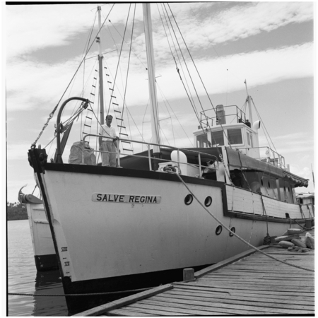 European man on docked boat, Salve Regina