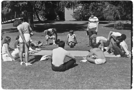 Students meeting on lawn on Matthews Campus