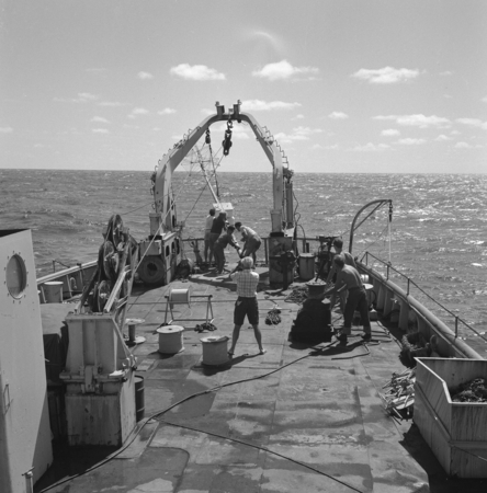[Nova Expedition, R/V Argo, 1967] G-10. Pago Pago [Deck of R/V Argo at Sea deploying Instrument] [Instrument is a slack wi...