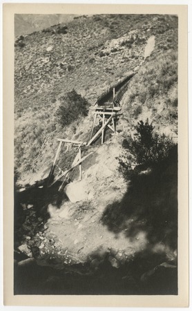 Damage to the San Diego flume above a gully from the 1916 flood