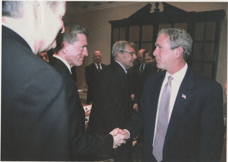 J. Robert Beyster (in background) and President George W. Bush (NSTAC)