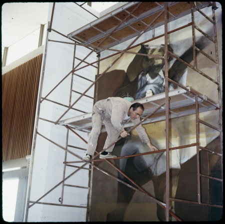 Howard Warshaw painting a mural in the Revelle Cafeteria