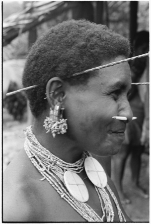 &#39;Oiru&#39;a, wearing fio nose pin, &#39;ausakwalo earsticks, girigwei&#39;a clamshell pendants, kwari&#39;ingari nut and bat-tooth ear orn...