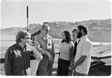 William Nierenberg with visitors on the Scripps Pier