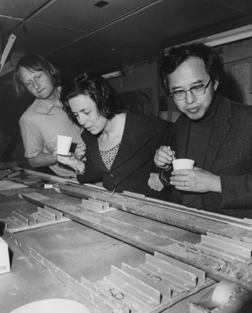 Scientists Daniel Bernoulli, Maria Cita, and Ken Hsu, aboard the D/V Glomar Challenger (ship) reviewing some core samples ...