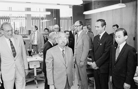 Emperor Hirohito of Japan visiting a marine biology laboratory at Scripps Institution of Oceanography. Scripps Director Wi...