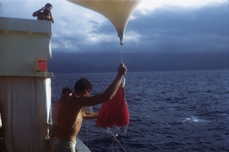 Meteorologists deploy weather balloon from R/V HORIZON