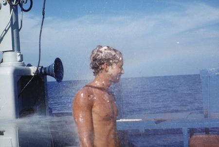 Pollywog (first time Equator crosser) Robert M. Kieckhefer being initiated during an Equator Crossing the Line ceremony, o...