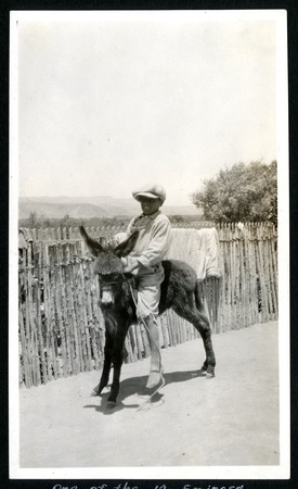 David &quot;Bil&quot; Espinoza Arce riding a burro in El Rosario