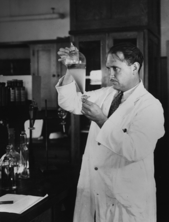 Denis Llewellyn Fox (1901-1983), in the biochemistry laboratory at Scripps Institution of Oceanography doing research on f...