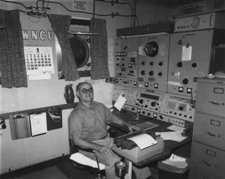 Crew member in the weather and Radio room in the D/V Glomar Challenger (ship) during the Deep Sea Drilling Project. 1978.