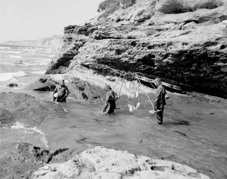 David Poole, Donald Sayner and Robert M. Norris in diving suits with sediment trap, Scripps Beach, La Jolla