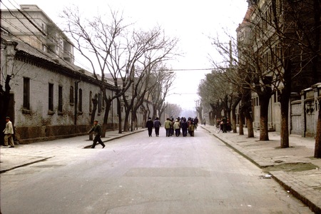 Beijing, former Foreign Legations Quarter, children marching