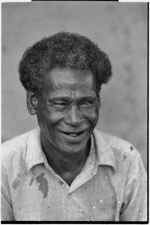 Older man, Motabasi, smiling
