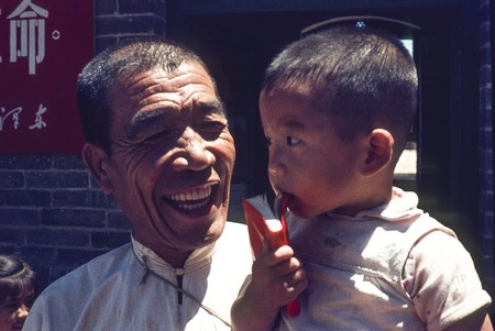 Chen Yonggui and a Child