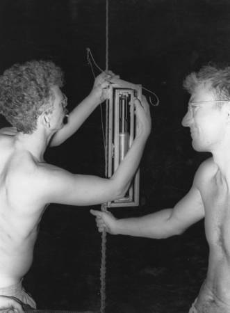 Theodore Robert Folsom (left) and Milton Nunn Bramlette (right) examine water sampler