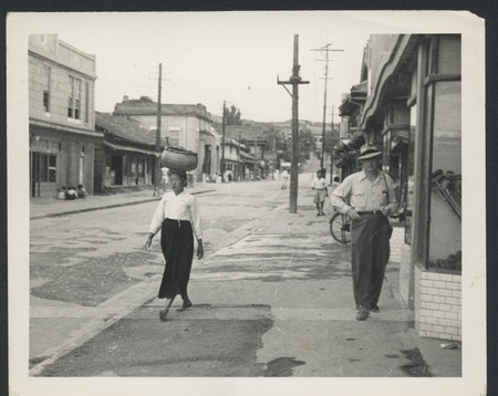 Claude M. Adams on the street. Phillipines, October 30, 1952