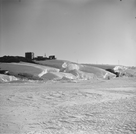 Mirny Station oil tanks, as seen from the sea ice