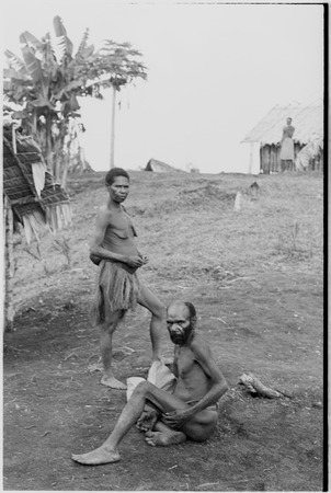 Yeria, Wanuma Census Division: older man and woman next to house