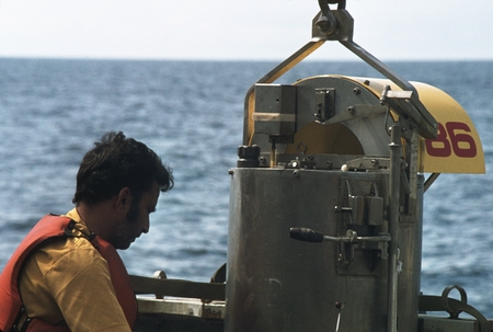 [Man with oceanographic instrument], GEOSECS Indian Ocean