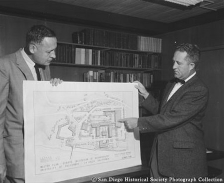 J.W. Tippetts (right) discussing master building plans for Scripps Institution of Oceanography with director Roger Revelle