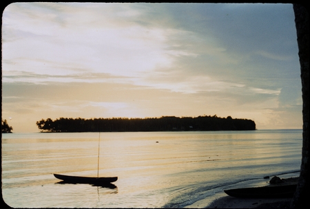 Coastal landscape with canoe
