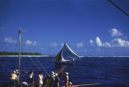 Samoan boats and natives in Pago Pago harbor as photographed by a member of the Capricorn Expedition (1952-1953) during a ...
