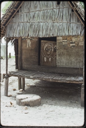 Chalk drawings and other decorations on a house in Wawela village, east coast of Kiriwina