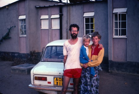 Dutch medical volunteer family in front of their home in Kaputa village