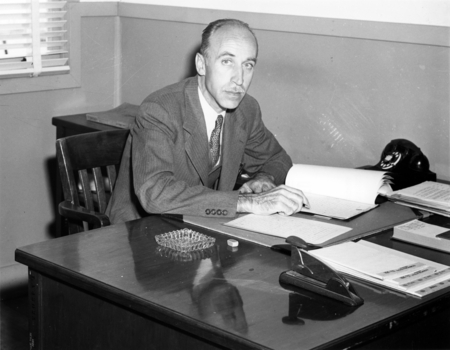 Carl Eckart at desk, University of California Division of War Research