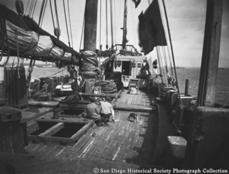 Two men on deck of Chinese junk